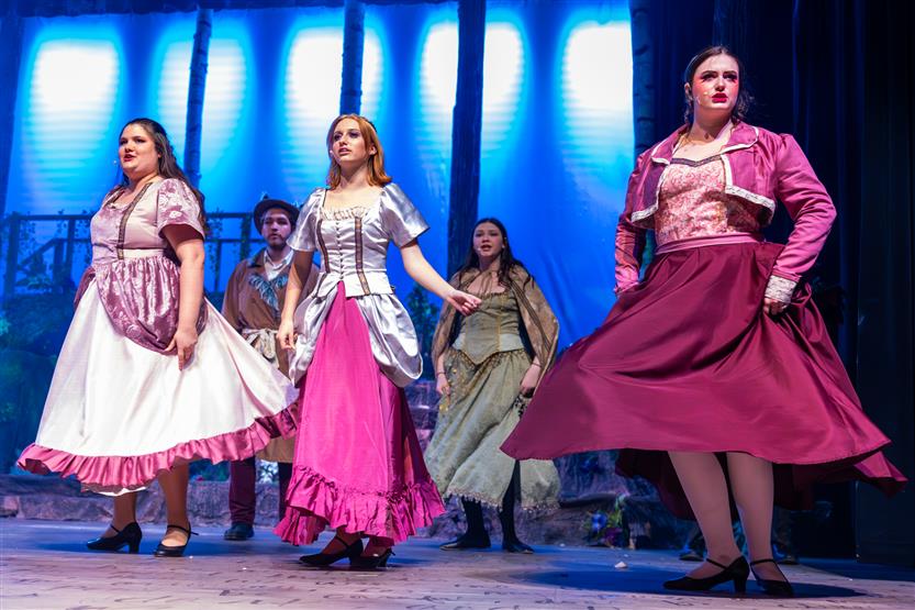 Students perform onstage